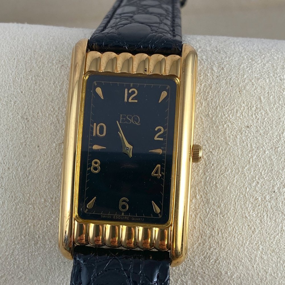 Vintage and Rare Gold Movado Esquire Sculptured Tank with Curvature Case Black